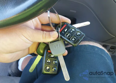 2009 Honda Odyssey Ex-L из США, поврежденный, VIN 5FNRL38659B014578